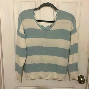 Cute sweater buttons down the back